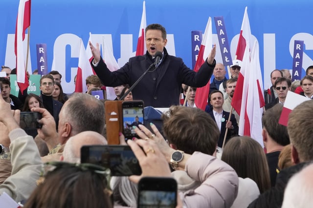 Warsaw Mayor Rafał Trzaskowski, a liberal candidate in Poland's presidential election, speaks to supporters during a campaign stop, in Lodz, Poland, Friday, May 9, 2025. (AP Photo/Czarek Sokolowski)
