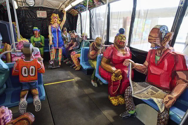 Interior view of The Bus by Red Grooms during a press preview at the Fenix Migration Museum in Rotterdam, Netherlands, Wednesday, May 14, 2025. (AP Photo/Peter Dejong)