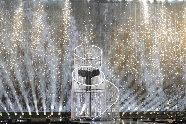 Yuval Raphael from Israel performs the song "New Day Will Rise" during the dress rehearsal for the second semi-final of the 69th Eurovision Song Contest, in Basel, Switzerland, Wednesday, May 14, 2025. (AP Photo/Martin Meissner)