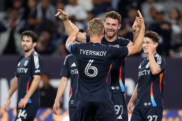 SAN DIEGO, CALIFORNIA – MAY 14: Jeppe Tverskov #6 congratulates Christopher McVey #97 of San Diego FC after his goal during the first half of a game against the Colorado Rapids at Snapdragon Stadium on May 14, 2025 in San Diego, California. (Photo by Sean M. Haffey/Getty Images)