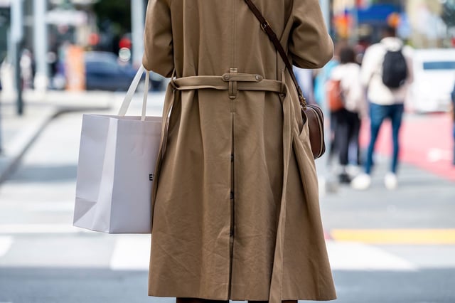 Wall Street and the Federal Reserve are watching for signs of consumers pulling back in the face of high uncertainty.