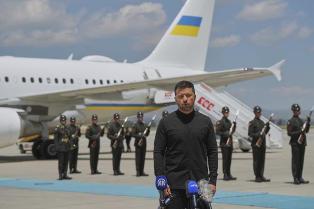 Ukrainian President Volodymyr Zelenskyy talks to journalists as he arrives at Esenboga airport in Ankara, Turkey, Thursday, May 15, 2025. 