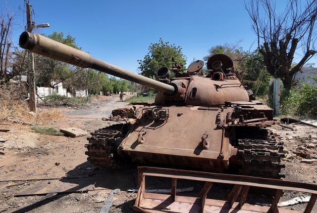 A destroyed tank is seen at a residential neighborhood as Sudan's army retakes ground and some displaced residents return to ravaged capital in the state of Khartoum Sudan March 26, 2025. REUTERS/El Tayeb Siddig/File Photo