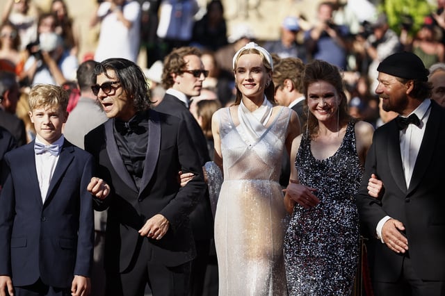 Team of the film "Amrum" presented as part of Cannes Premiere with director Fatih Akin and cast member Diane Kruger pose on the red carpet during arrivals for the screening of the film "Dossier 137" (Case 137) in competition at the 78th Cannes Film Festival in Cannes, France, May 15, 2025. REUTERS/Sarah Meyssonnier