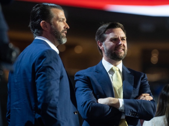 WASHINGTON - JULY 16: Sen. J.D. Vance, R-Ohio, right, the running mate of former President Donald Trump, Republican presidential nominee, and Donald Trump Jr., are seen on stage during a sound check in the Fiserv Forum before the second day's session of Republican National Convention in Milwaukee, Wis., on Tuesday, July 16, 2024. (Tom Williams/CQ-Roll Call, Inc via Getty Images)