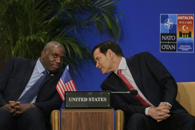 United States Secretary of State Marco Rubio, right, talks to British Foreign Secretary David Lammy during an informal meeting of NATO&#39;s foreign ministers in Antalya, southern Turkey, Thursday, May 15, 2025.