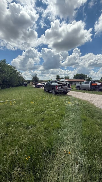 Emergency services and fire fighters responding to a potential killer bee attack in Comanche, Texas that killed three quarter horses.