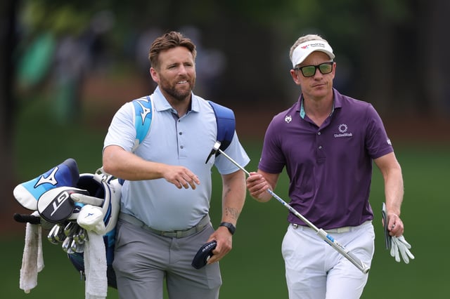 Luke Donald of England and his caddie walk the 11th hole prior to the PGA Championship at Quail Hollow Country Club on May 14, 2025 in Charlotte, North Carolina.