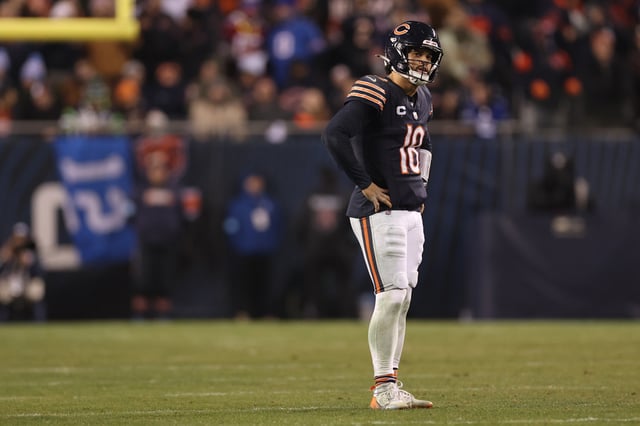 CHICAGO, ILLINOIS - DECEMBER 26: Caleb Williams #18 of the Chicago Bears looks on against the Seattle Seahawks during the fourth quarter at Soldier Field on December 26, 2024 in Chicago, Illinois.