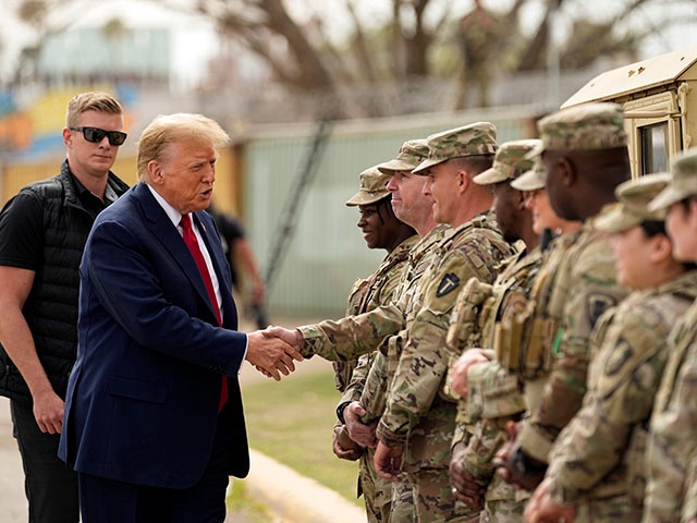 Republican presidential candidate former President Donald Trump greets members of the National Guard on the U.S.-Mexico border, Feb. 29, 2024, in Eagle Pass, Texas. (AP Photo/Eric Gay, File)