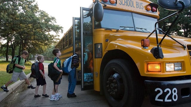A Star-Telegram file photo of Colleyville Elementary School children boarding the bus on Aug. 29, 2007