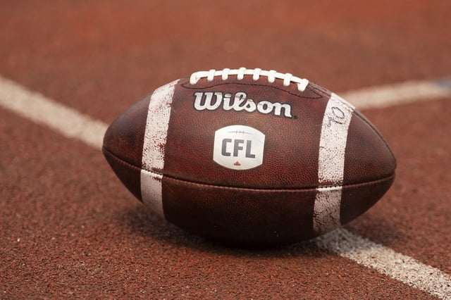 Canadian Football League logo seen on a football during CFL training camp in Guelph, Ont., Sunday, May 12, 2024. 