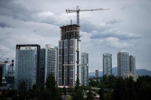 Greater Vancouver's real estate board says the number of homes sold in June tumbled 19.1 per cent from the previous year as inventory continued accumulating to levels not seen since the spring of 2019. Buildings under construction are pictured in Surrey, B.C. on Wednesday, June 26, 2024. THE CANADIAN PRESS/Ethan Cairns