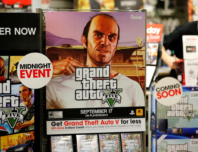 A promotion for the computer game "Grand Theft Auto Five" is show in a Game Stop gaming story in Encinitas, California September 17, 2013.     REUTERS/Mike Blake/File Photo