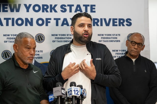 Driver, Juan Grullon, 32, middle speaks about getting robbed and pepper sprayed alongside Fernando Mateo, left, at a press conference Thursday, May 15, 2025 in The Bronx, New York.  (Barry Williams/ New York Daily News)