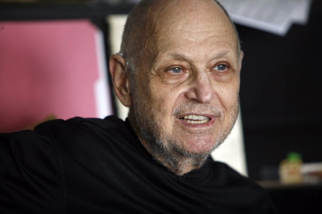 FILE - Composer Charles Strouse is interviewed in his apartment, June 3, 2008, in New York. (AP Photo/Richard Drew, File)