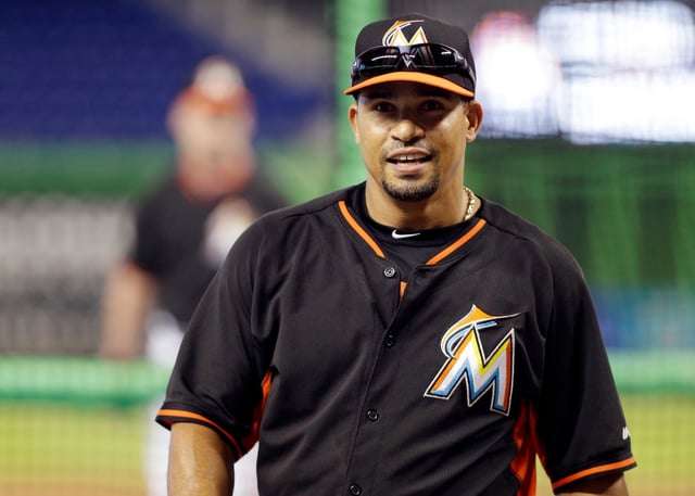 FILE - In this Wednesday, April 30, 2014 file photo, Miami Marlins infielder Rafael Furcal (15) smiles during batting practice before a baseball game against the against the Atlanta Braves in Miami. (AP Photo/File)