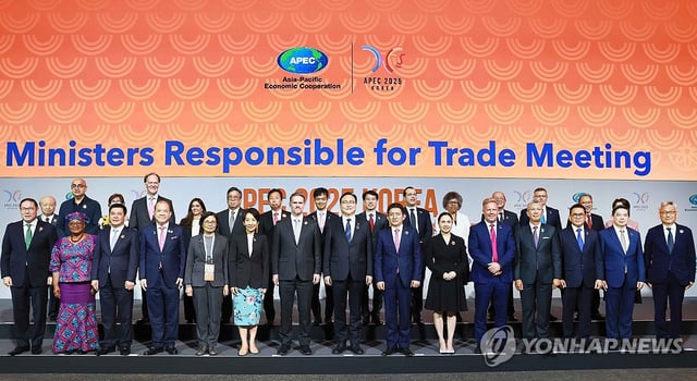 Participants in a trade ministers' meeting of the Asia-Pacific Economic Cooperation member economies pose for a photo during the opening ceremony on the southern resort island of Jeju on May 15, 2025, in this photo provided by South Korea's trade ministry. (PHOTO NOT FOR SALE) (Yonhap)