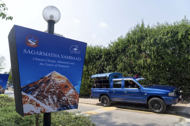Nepalese policemen stand guard during the inauguration of an environment conference named Sagarmatha Sambaad (Mount Everest Dialogue) at the Soaltee Hotel in Kathmandu, Nepal, Friday, May 16, 2025. (AP Photo/Niranjan Shrestha)estha)