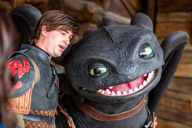 An actor playing Hiccup facilitates guest interactions with Toothless the dragon within &#34;How to Train Your Dragon – Isle of Berk&#34; at Universal Epic Universe. (Patrick Connolly/Orlando Sentinel)