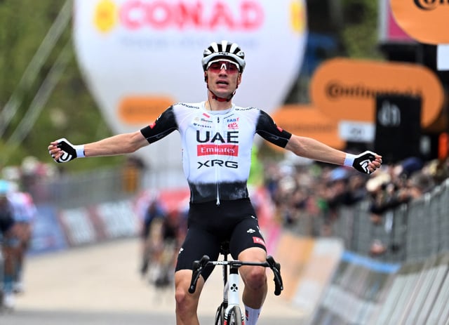 Cycling - Giro d'Italia - Stage 7 - Castel di Sangro to Tagliacozzo - Italy - May 16, 2025 UAE Team Emirates's Juan Ayuso celebrates as he crosses the line to win stage 7 REUTERS/Jennifer Lorenzini