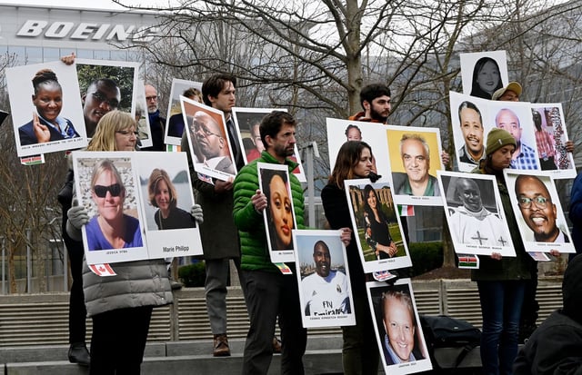 Families and friends who lost loved ones in the March 2019 Boeing 737 Max crash in Ethiopia, hold a memorial protest in front of the Boeing headquarters in Arlington, Virginia, in 2023 to mark the four-year anniversary of the event. Attorneys for those families say that the Justice Department is looking at dropping criminal charges against Boeing that arose out of the crash.