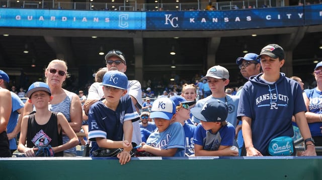 Young fans wait for autographs prior to the game between the Kansas City Royals and the Cleveland Guardians at Kauffman Stadium on June 30, 2024.