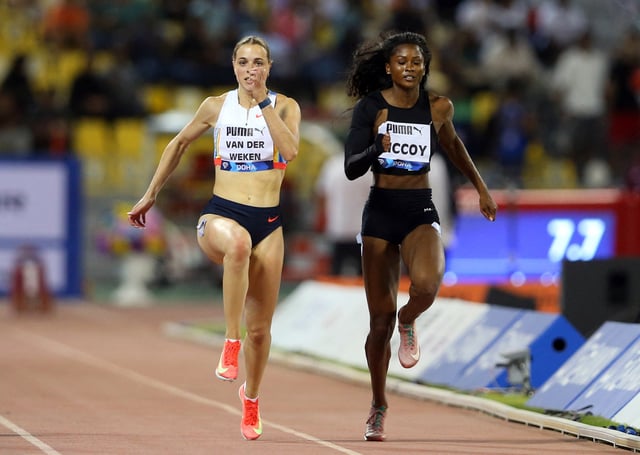 Athletics - Diamond League - Doha - Qatar Sports Club Stadium, Doha, Qatar - May 16, 2025 Luxembourg's Patrizia van der Weken and Maia McCoy of the U.S. in action during the Women's 100m REUTERS/Ibraheem Al Omari