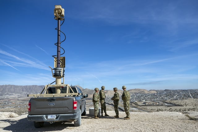 FILE - Army soldiers look at the border wall next to a surveillance vehicle during the visit to the U.S. and Mexico border by Defense Secretary Pete Hegseth in Sunland Park, N.M., Monday, Feb. 3, 2025. (AP Photo/Andres Leighton, File)