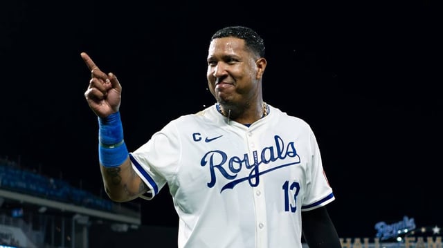 Kansas City Royals first baseman Salvador Perez (13) reacts after getting doused after defeating the St. Louis Cardinals at Kauffman Stadium on Aug. 10, 2024.
