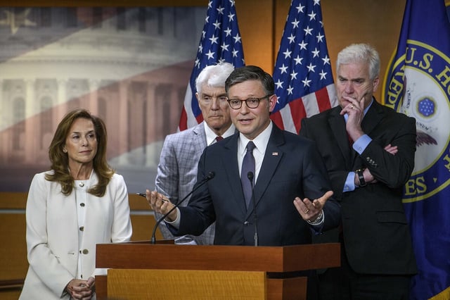 House Republicans gather behind Speaker of the House Mike Johnson of Louisiana, including (from left) Lisa McClain of Michigan, Roger Williams of Texas, and House Majority Whip Tom Emmer of Minnesota, as Mr. Johnson responds to reporters' questions during a news conference at the Capitol, May 6, 2025, in Washington. 