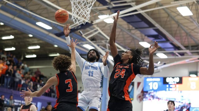 Oak Park’s Corbin Allen puts up a shot against Shawnee Mission Northwest during the finale of 810 Varsity Showcase 36 high school basketball event on Saturday, Dec. 7, 2024.
