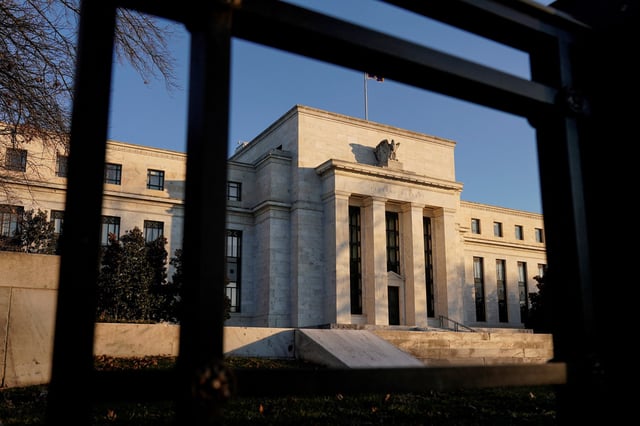 The Federal Reserve building is seen before the Federal Reserve board is expected to signal plans to raise interest rates in March as it focuses on fighting inflation in Washington, U.S., January 26, 2022.      REUTERS/Joshua Roberts/File Photo
