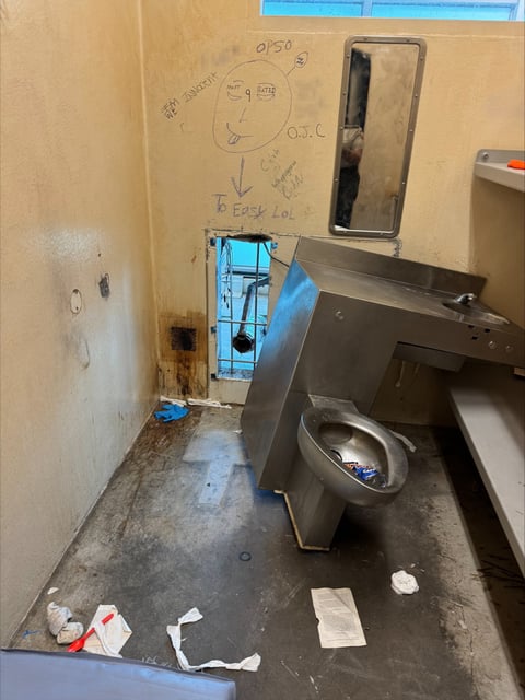 Inside of a prison cell where the escape is believed to have happened, at Orleans Parish Justice Center on Friday. Image blurred by NBC News.