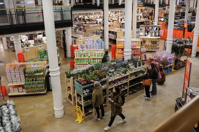 People shop at a Home Depot store in Manhattan in New York City, U.S.,  February 25, 2025. REUTERS/Jeenah Moon