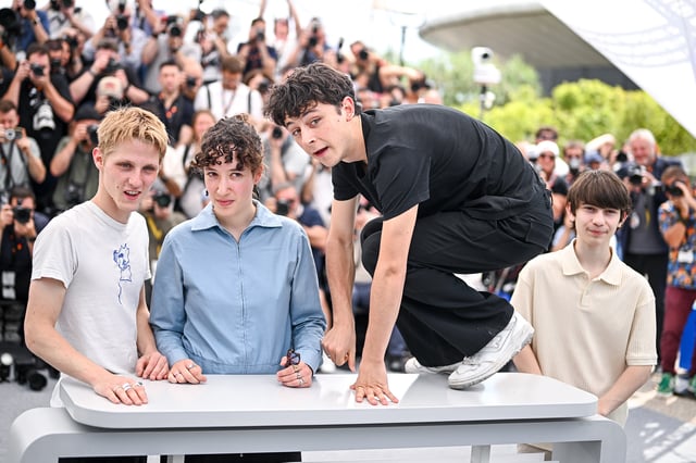 Valentin Campagne, Mathilde Riu, Côme Péronnet and Solàn Machado-Graner pose during the “Dossier 137” photocall at the 78th annual Cannes Film Festival at Palais des Festivals on May 16, 2025, in Cannes, France