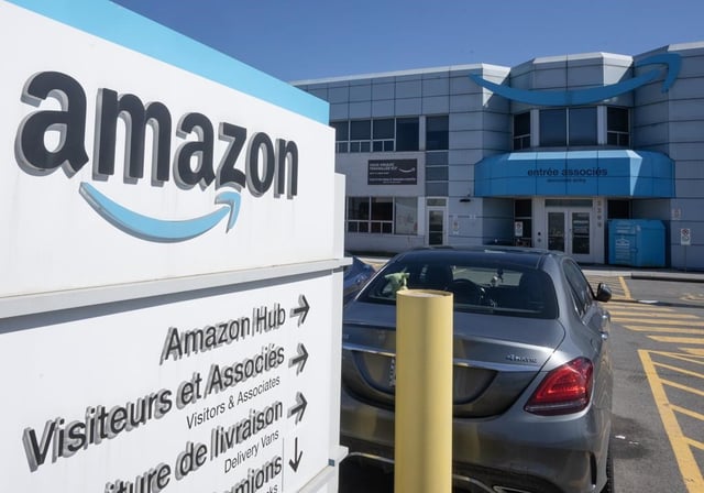 The federal industry minister is calling for a review of Ottawa’s "business relationship" with Amazon after the company said it will close all seven of its warehouses in Quebec. The Amazon DXT4 warehouse is seen in Laval, Que., Monday, April 22, 2024. THE CANADIAN PRESS/Ryan Remiorz