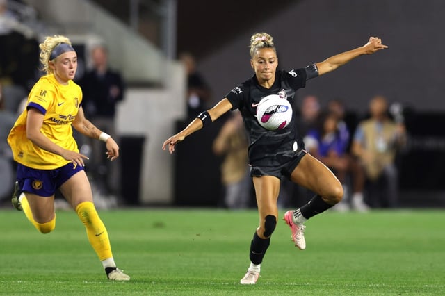 Angel City FC defender Sarah Gorden, right, recovers the ball against the Utah Royals FC during the second half Friday, May 9, 2025, at BMO Stadium. (Photo by Raul Romero Jr., Contributing Photographer)