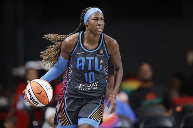 Rhyne Howard #10 of the Atlanta Dream dribbles against the Washington Mystics during the second half at Gateway Center Arena on June 30, 2023 in College Park, Georgia.
