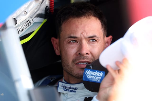 Kyle Larson, driver of the #5 HendrickCars.com Chevrolet, looks on in his car during qualifying for the NASCAR Cup Series AdventHealth 400 at Kansas Speedway on May 10, 2025 in Kansas City, Kansas.