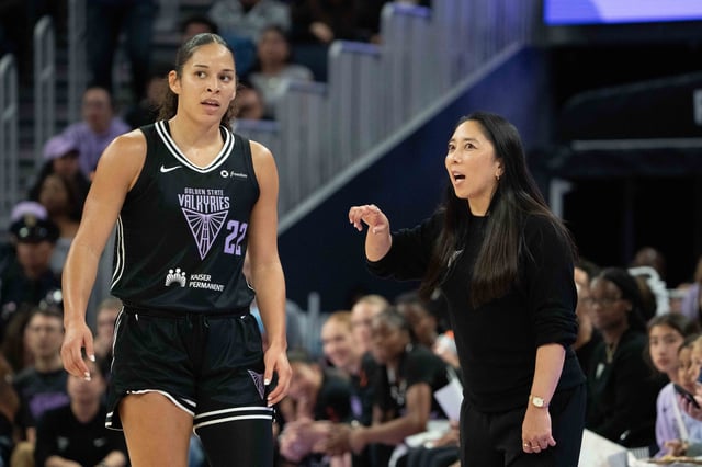 Golden State Valkyries guard Veronica Burton (22) and head coach Natalie Nakase during the third quarter of a May 6 preseason game.