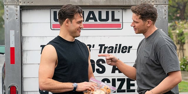 Eddie Diaz and Evan "Buck" Buckley (Buddie) saying goodbye in front of a moving truck in 9-1-1 Season 8