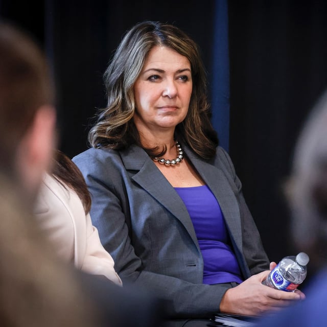 Alberta Premier Danielle Smith listens to speakers after announcing the "New North America Initiative", led by the University of Calgary’s School of Public Policy in Calgary, Alta., Friday, May 16, 2025. THE CANADIAN PRESS/Jeff McIntosh