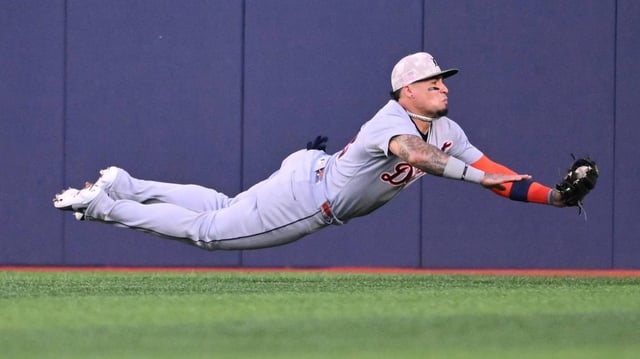 May 16, 2025; Toronto, Ontario, CAN; Detroit Tigers center fielder Javier Baez (28) catches a fly ball hit by Toronto Blue Jays right fielder Nathan Lukes (not pictured) in the second inning at Rogers Centre. Mandatory Credit: Dan Hamilton-Imagn Images