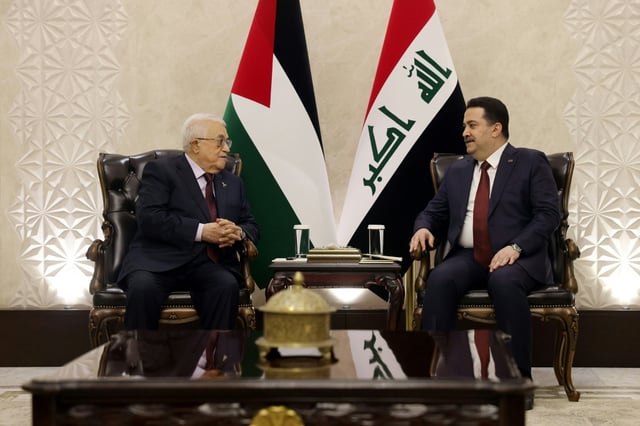 Iraqi Prime Minister Mohammed Shia al-Sudani (R) hold talks with Palestinian president Mahmud Abbas ahead of Saturday's Arab League meeting in Baghdad.