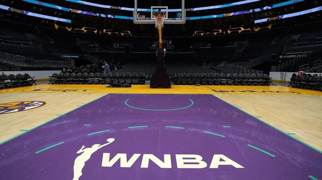 WNBA logo on the court at Crypto.com Arena