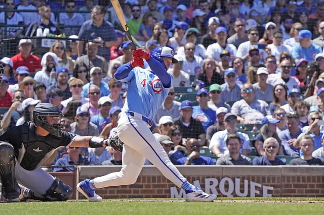 May 16, 2025; Chicago, Illinois, USA; Chicago Cubs outfielder Pete Crow-Armstrong (4) hits a three run home run against the Chicago White Sox during the second inning at Wrigley Field. David Banks-Imagn Images