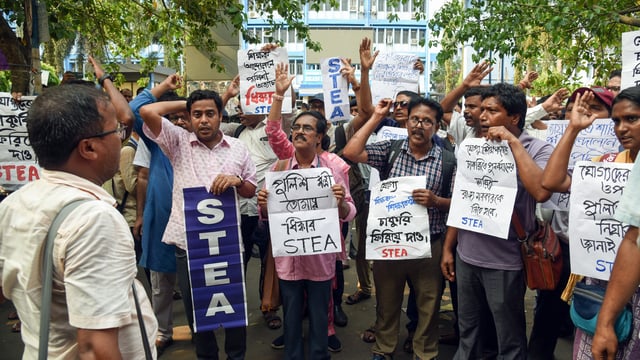 Teachers and non-teaching staff stage a sit-in protest against police lathi-charge on protesters on May 15 in front of Bikash Bhawan during a protest against the Supreme Court's order to cancel appointments of over 25,000 staff.