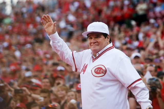 In this June 24, 2016, file photo, former Cincinnati Red Pete Rose waves to the crowd as he is introduced on the field during a ceremony to honor the 1976 World Series champions team, before the Reds&#39; baseball game against the San Diego Padres in Cincinnati. (AP Photo/John Minchillo, File)