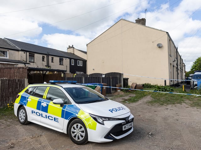 ROCHDALE, ENGLAND - MAY 04: Police forensic officers search a house on May 04, 2025 in Rochdale, England. According to Metropolitan Police, five men were arrested overnight during pre-planned counter terrorism raids in Greater Manchester, Swindon, and London, as part of an investigation into "a suspected plot to target a specific premises." Four of the five were arrested under the Terrorism Act (TACT) and are Iranian nationals, police confirmed, with the fifth man's nationality still being determined. (Photo by Ryan Jenkinson/Getty Images)